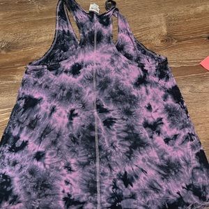 Purple tie dye racer back tank top with scoop bottom